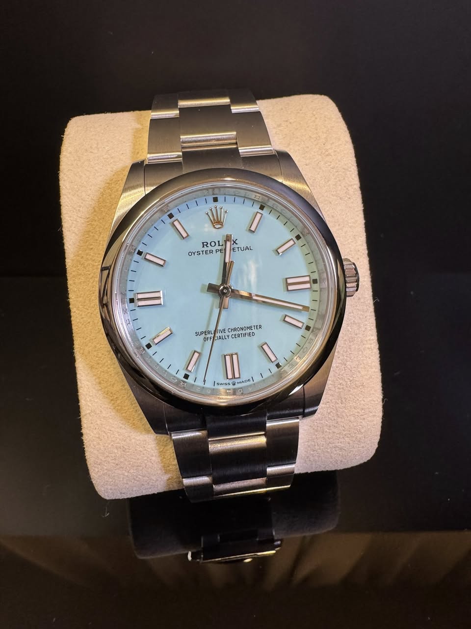 May be an image of wrist watch and text
