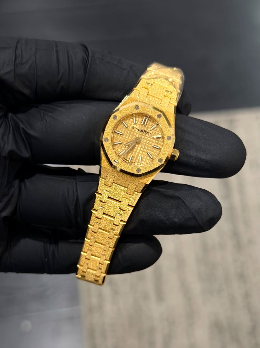 May be an image of wrist watch and text