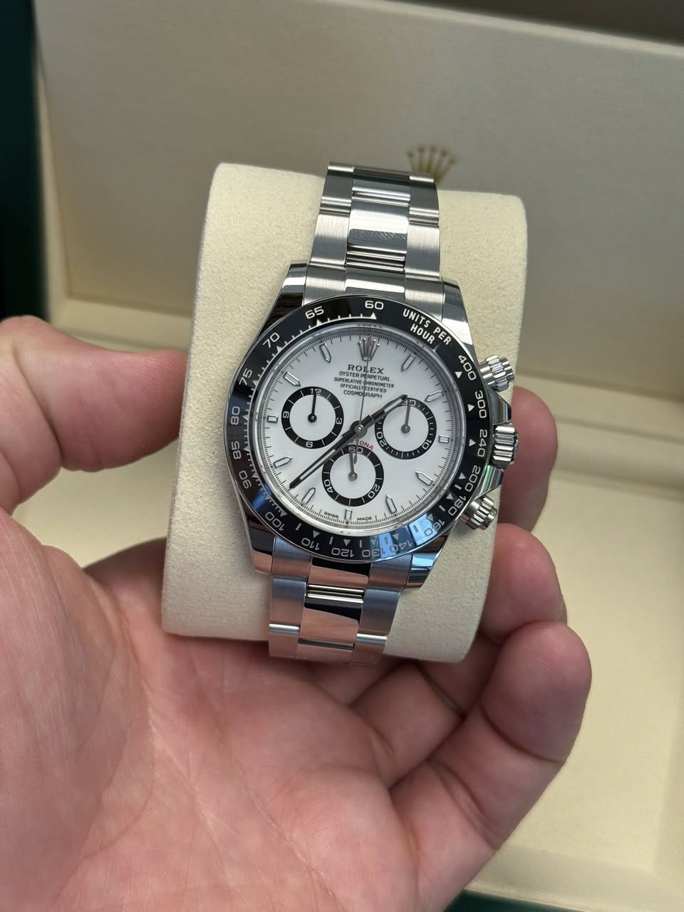 May be an image of wrist watch and text