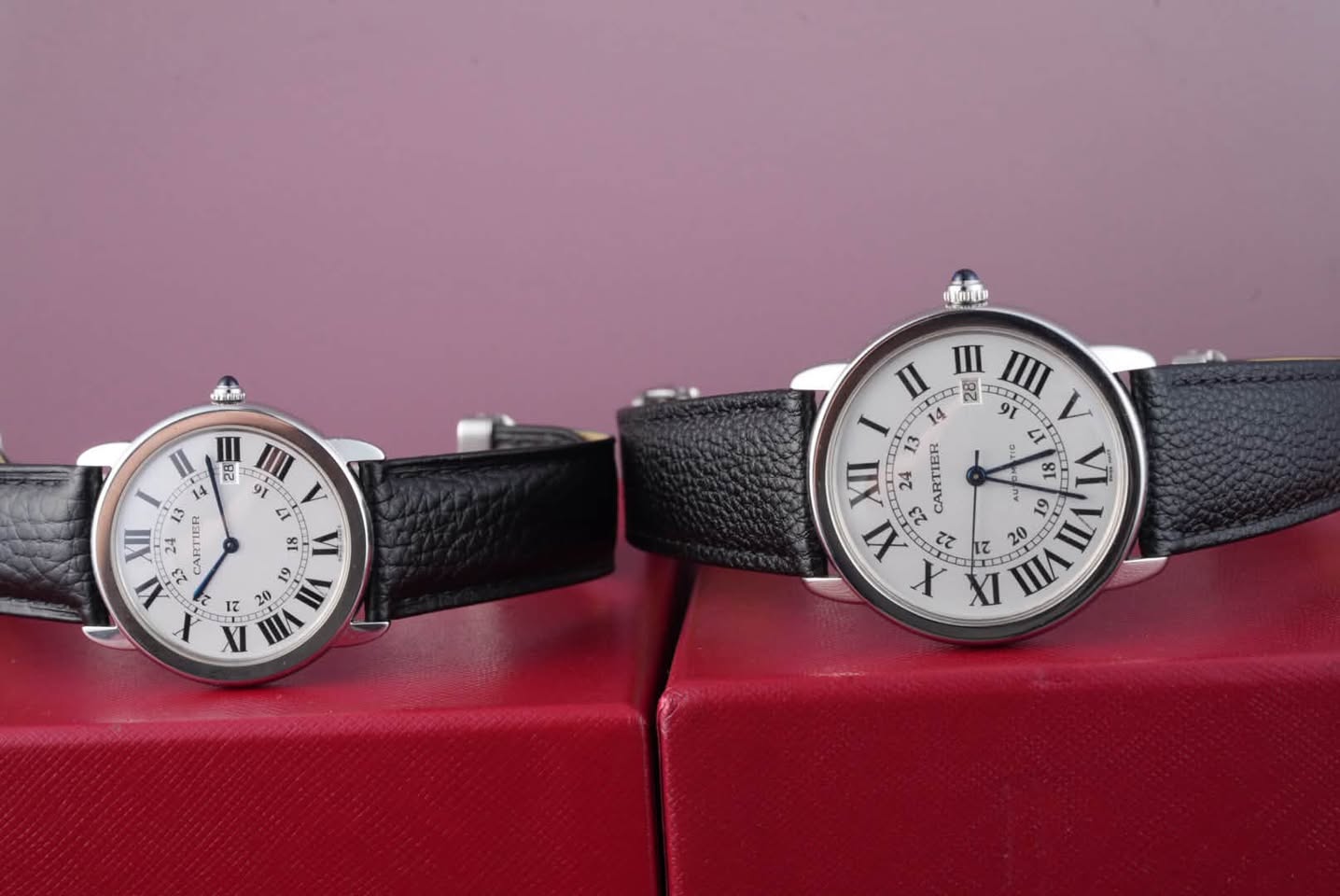 May be an image of leather, wrist watch and text