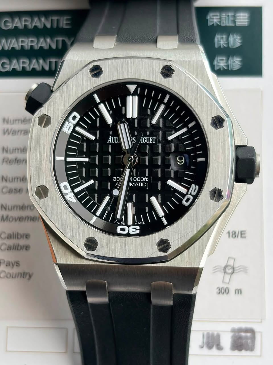 May be an image of wrist watch and text that says 'GARAN NARRAN GARANT/ 保証書 傑修 保修 Numén Warra Numé Refen AUD AGUET Numé Case 30 A 1000ft MATIC C 40 Numéro Movemen 22 D0 Calibre…