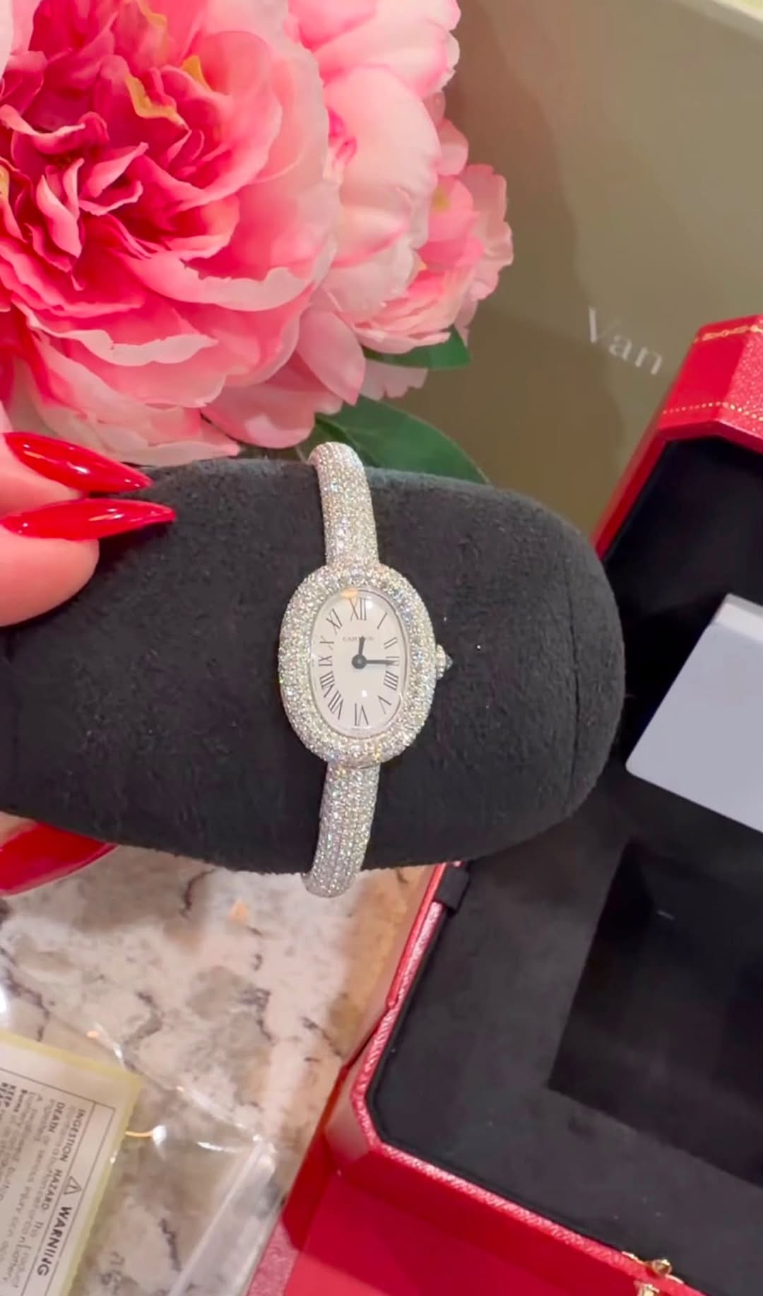 May be an image of ring, wrist watch and text