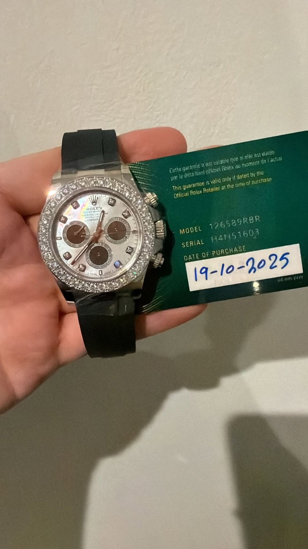 May be an image of wrist watch and text