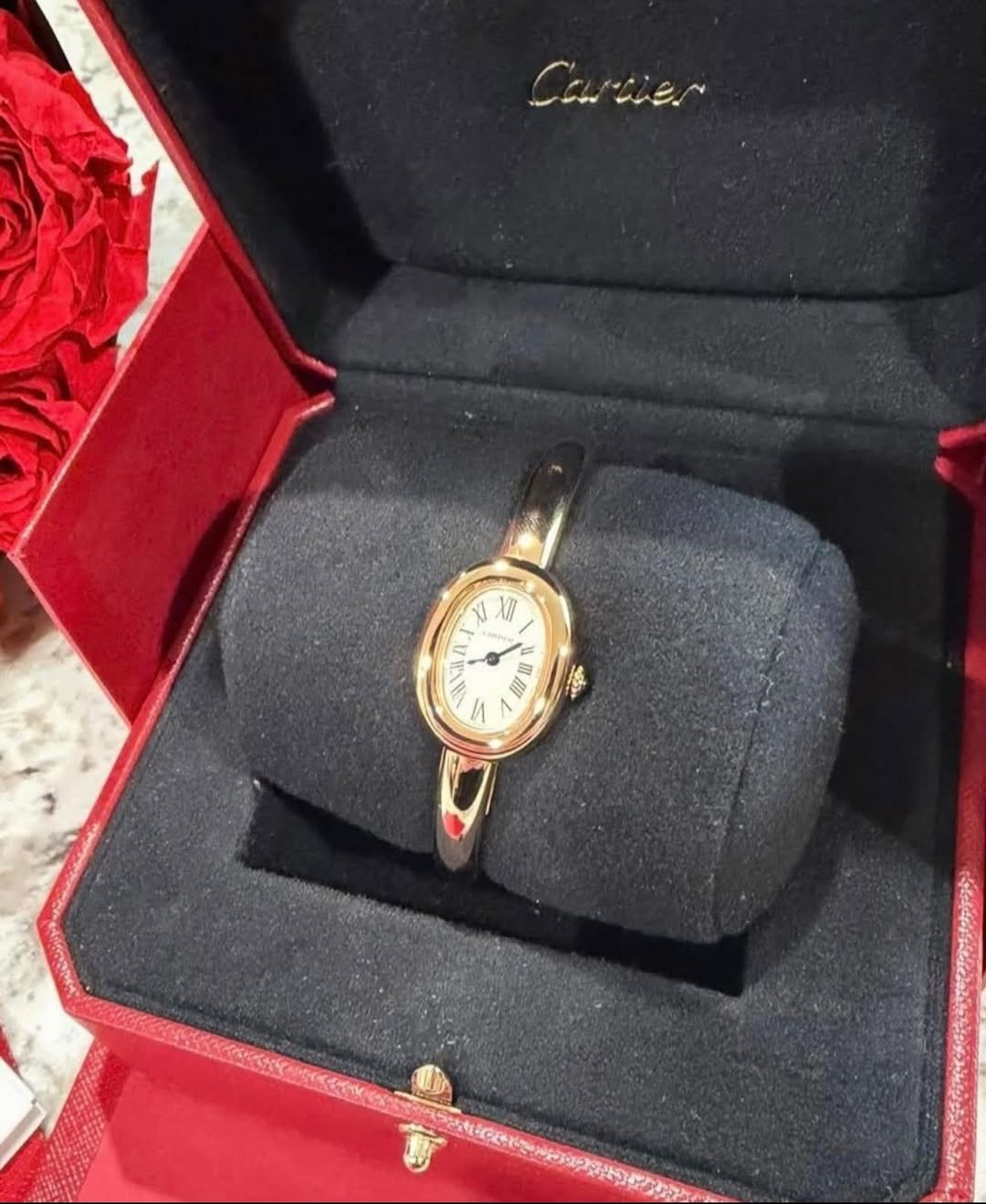 May be an image of wrist watch and text