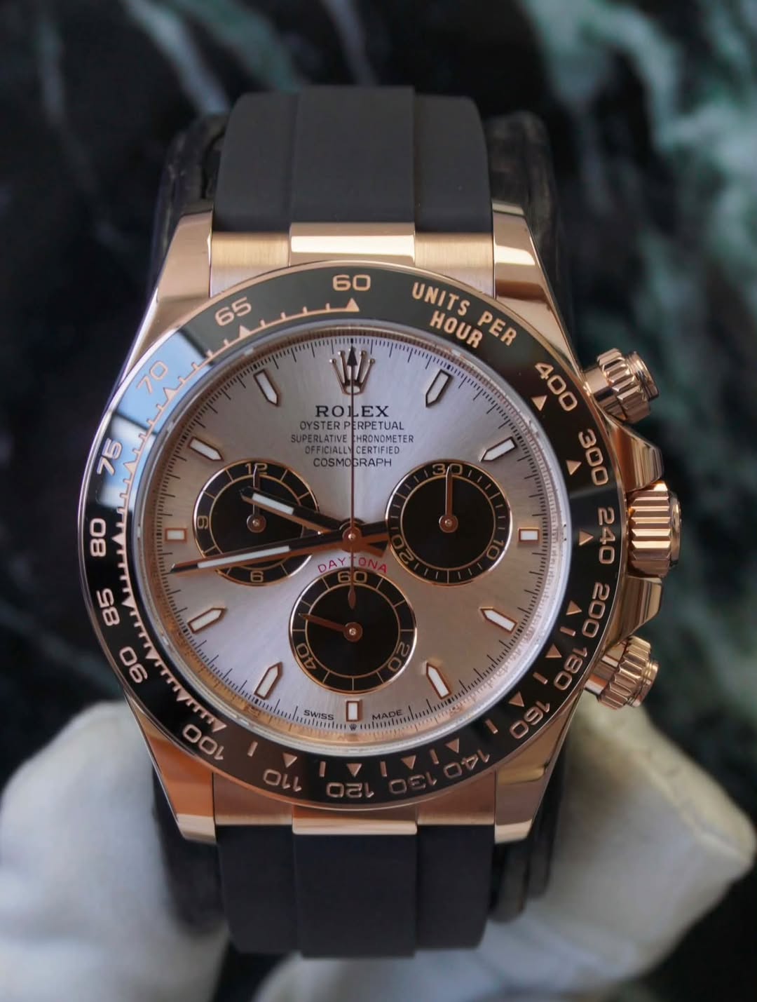 May be an image of wrist watch and text