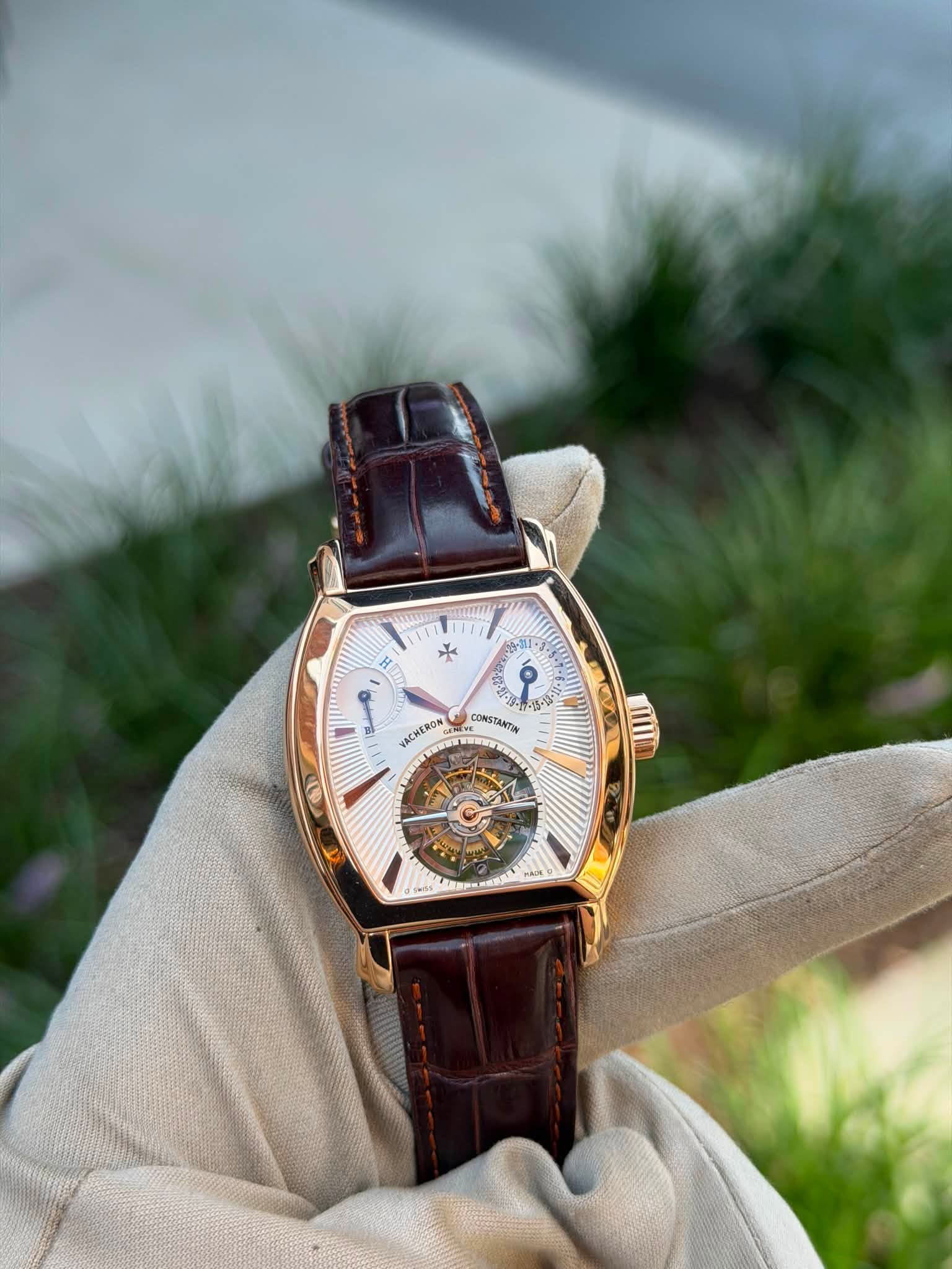 May be an image of wrist watch and text