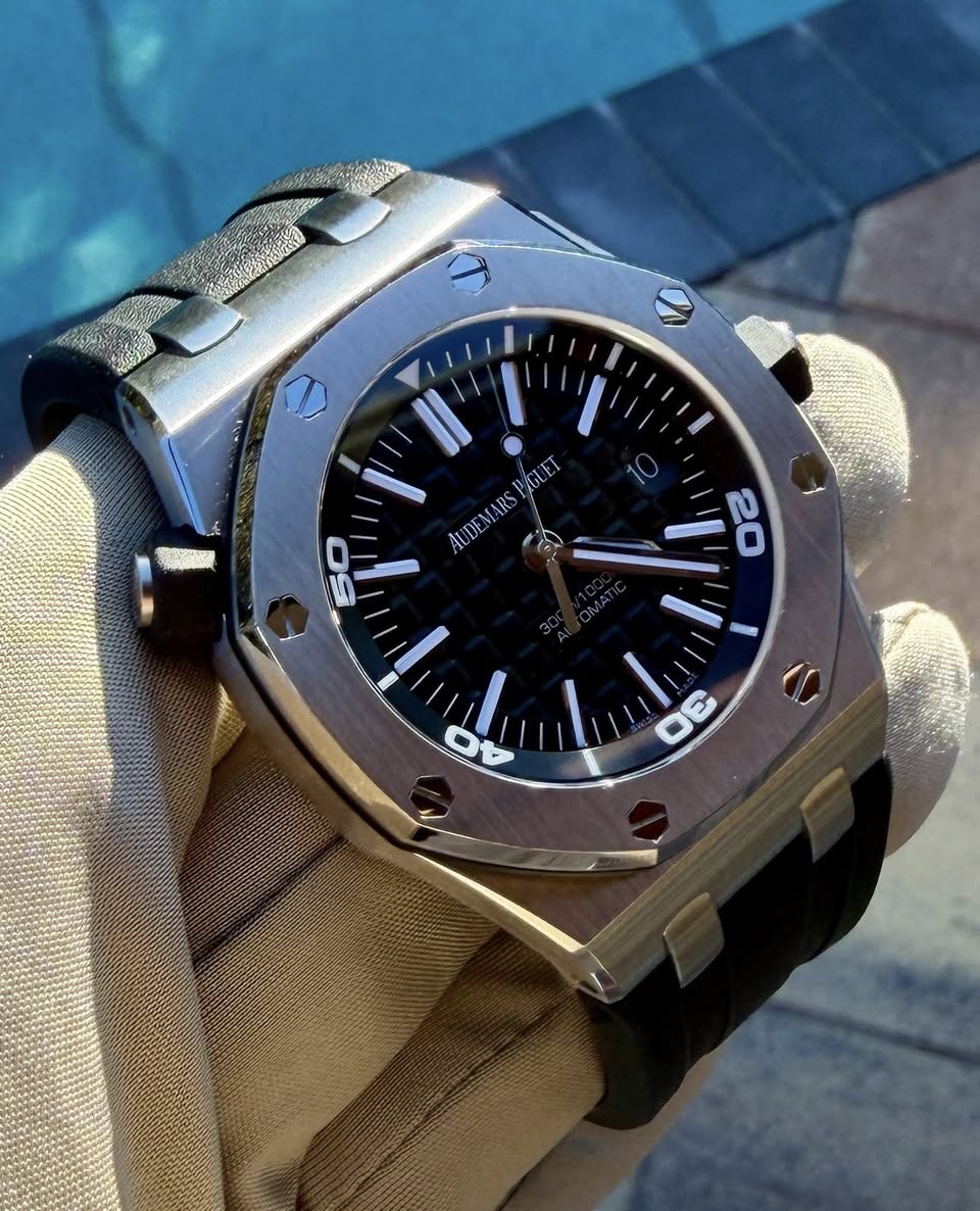 May be an image of wrist watch and text