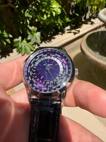 May be an image of wrist watch
