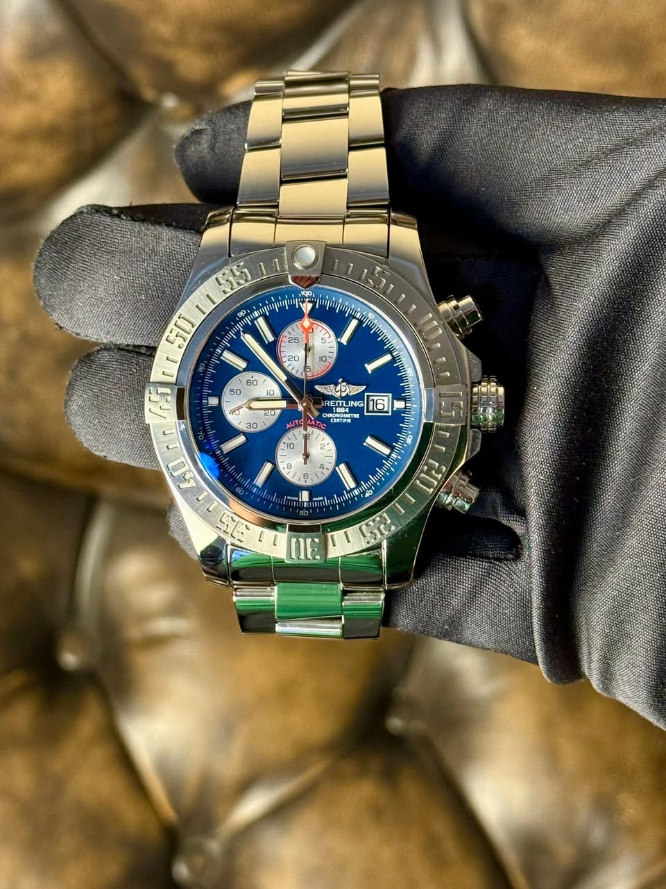May be an image of wrist watch and text