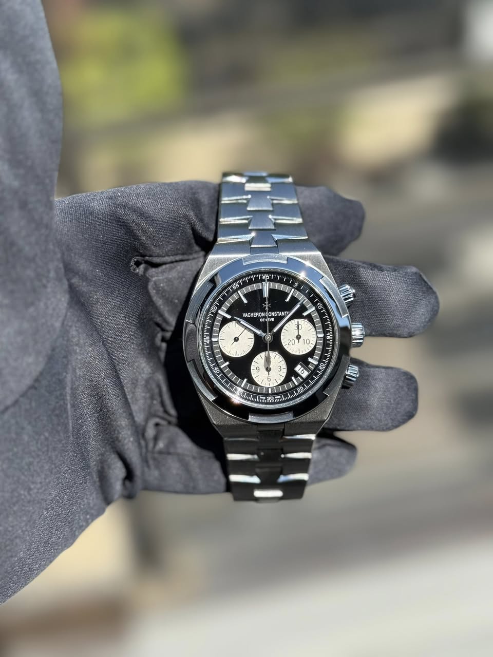 May be an image of wrist watch and text