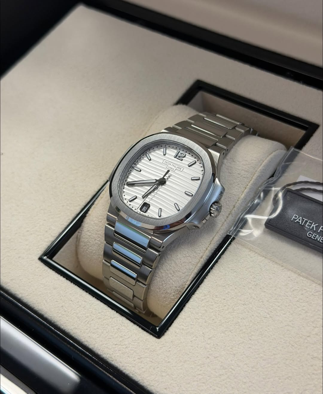 May be an image of wrist watch and text