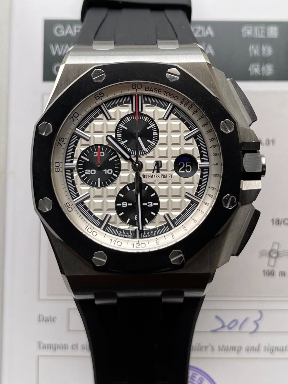 May be an image of wrist watch and text