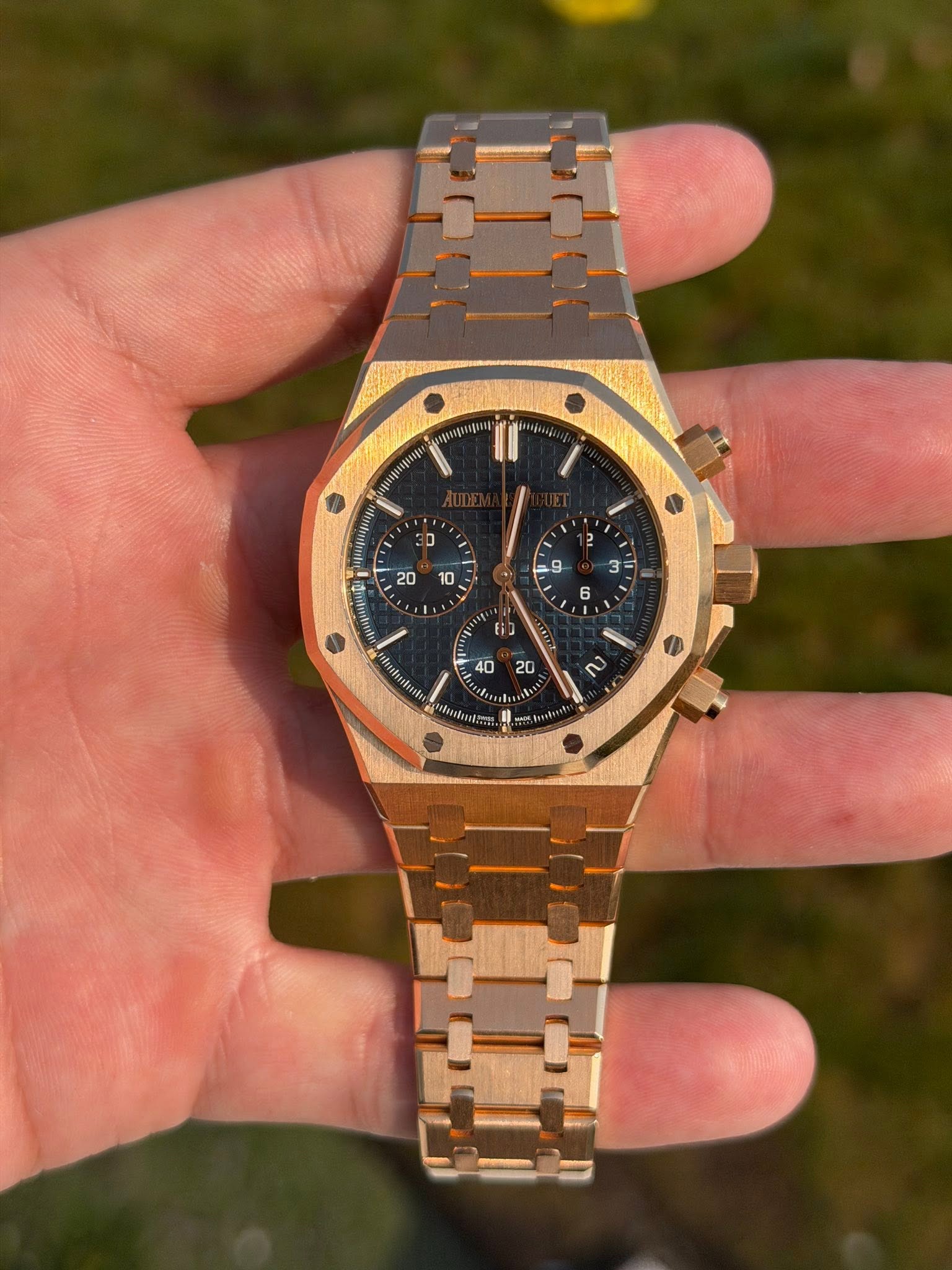 May be an image of wrist watch and text