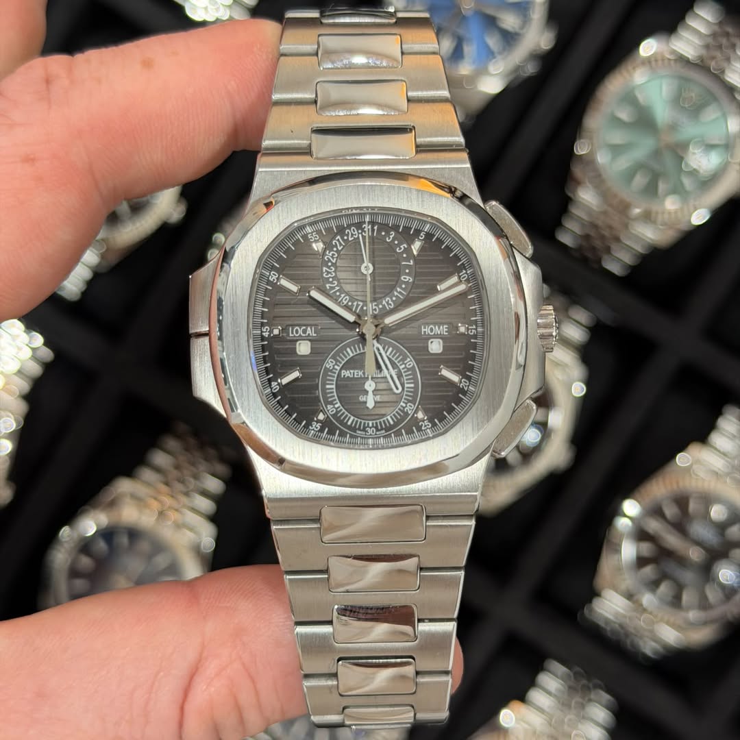 May be an image of wrist watch and text that says '$5 2 ۱٠ LOCAL HOME ทด ن PATEK m 5 20 el'