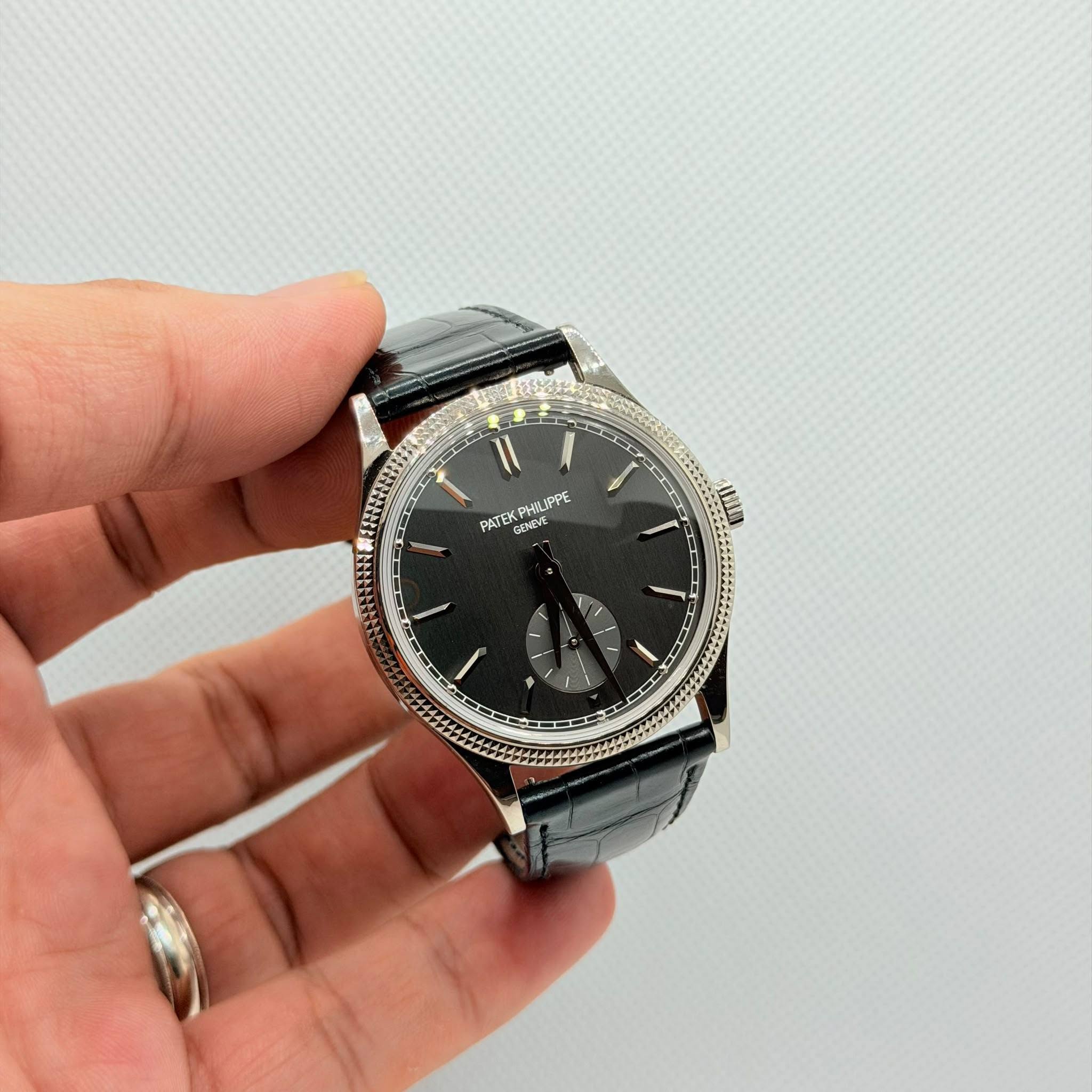 May be an image of digital watch and text
