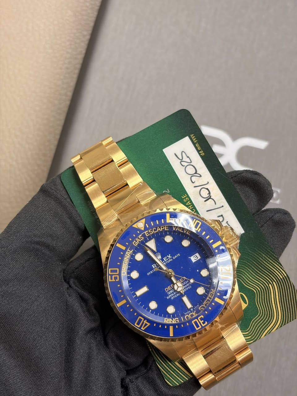 May be an image of wrist watch and text