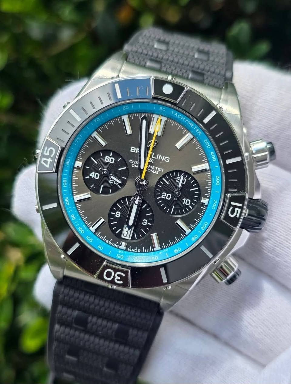 May be an image of wrist watch and text