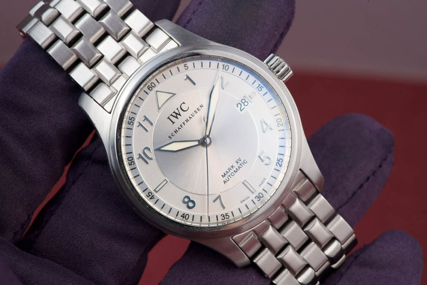 May be an image of wrist watch and text