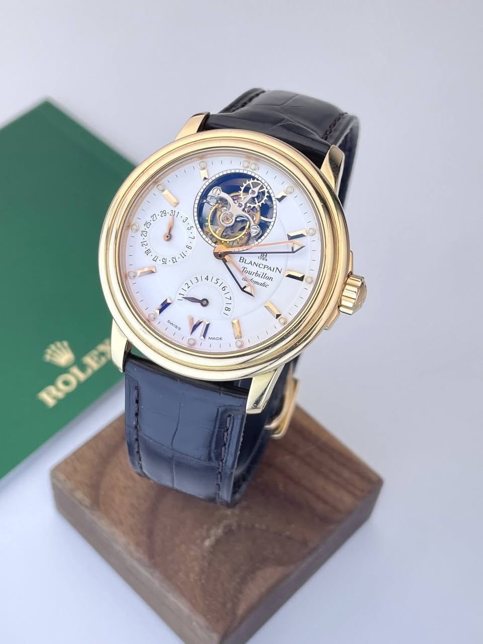 May be an image of wrist watch and text