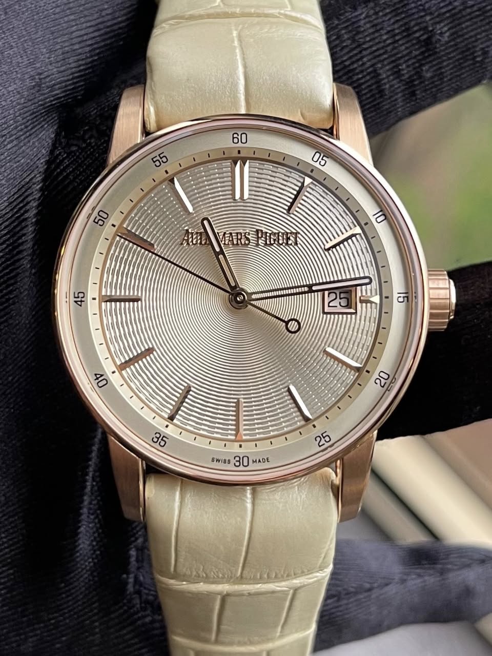 May be an image of wrist watch and text