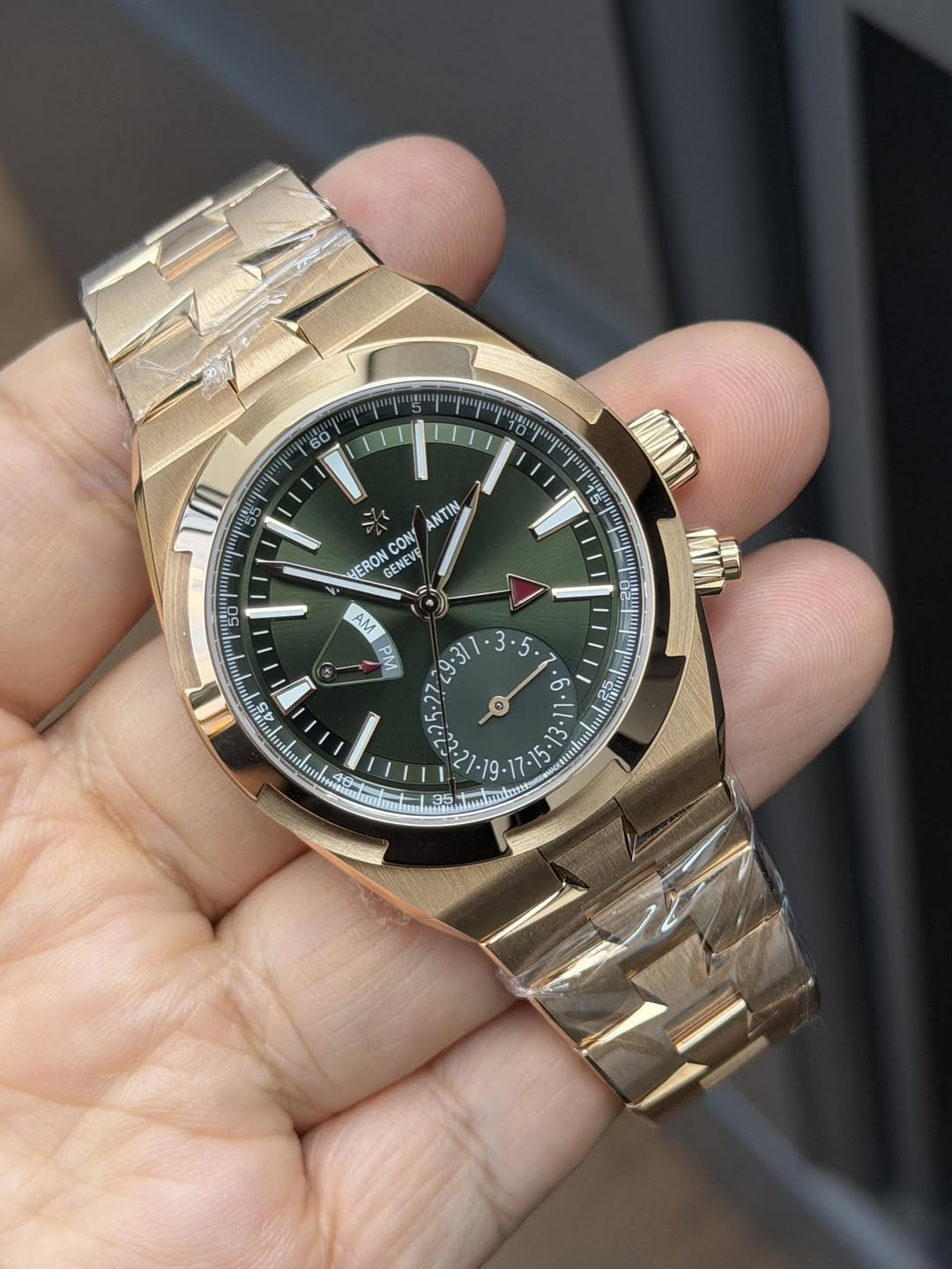 May be an image of wrist watch and text
