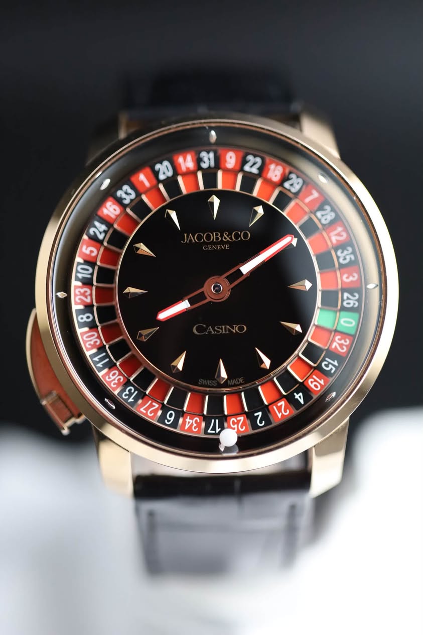 May be an image of wrist watch and text