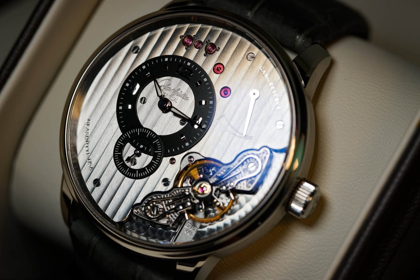 May be an image of wrist watch and text