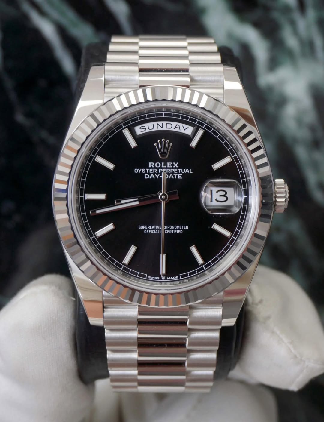May be an image of wrist watch and text that says 'SUNDAY W ROLEX OYS OYSTERPERPETUAL ETUAL OYSTER PERPETI DAY-DATE DATE DAY 13 SUPERLATIVE SUPEALCILT HRONOMETER OFFICIALL…