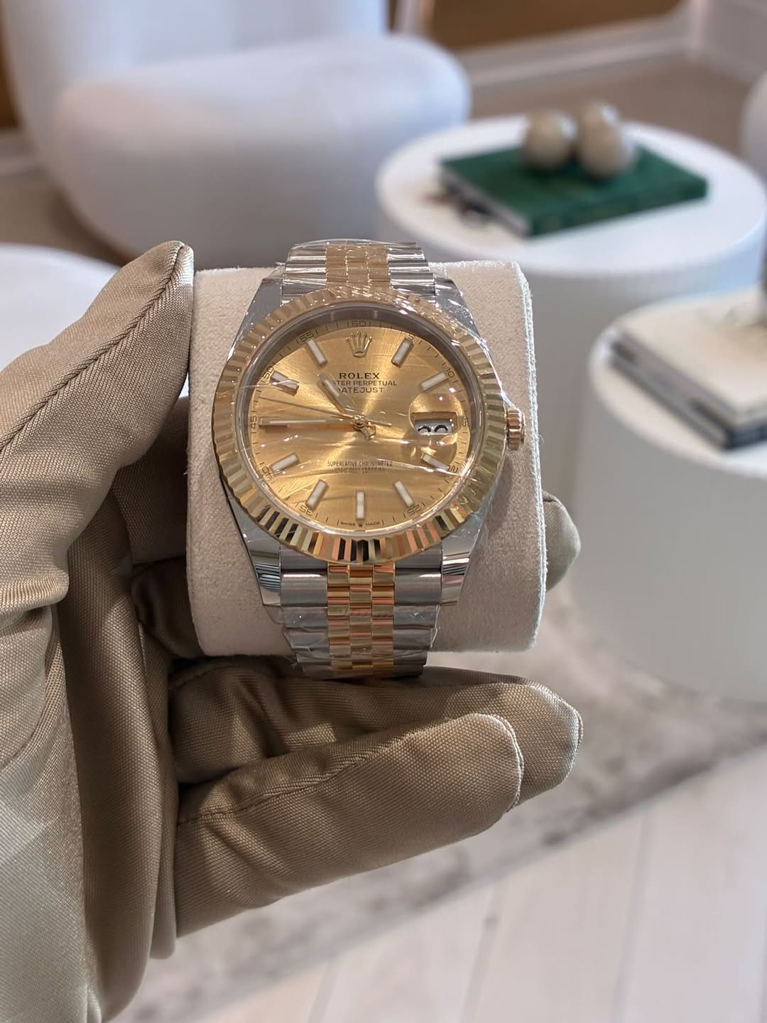 May be an image of wrist watch and text