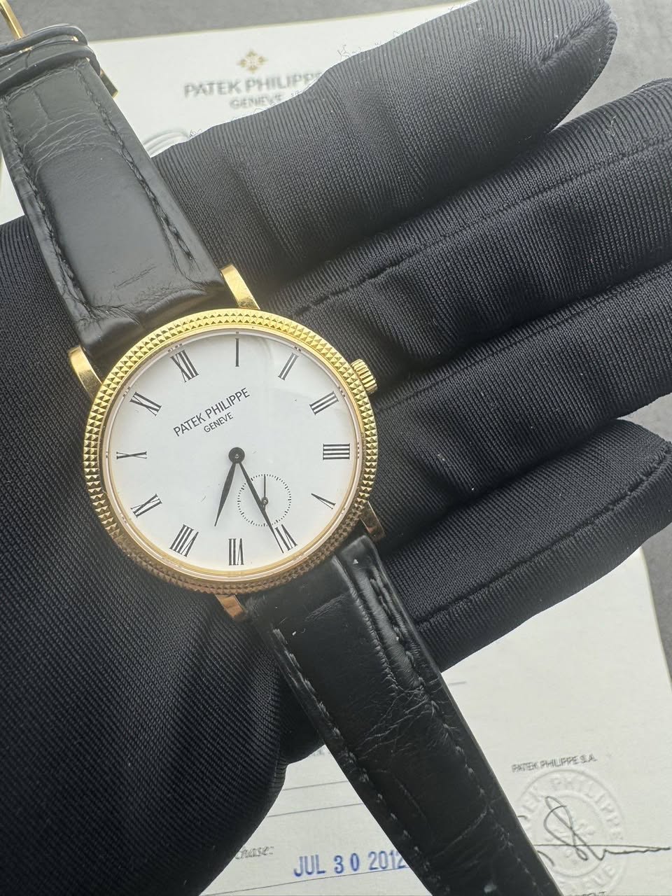 May be an image of wrist watch and text