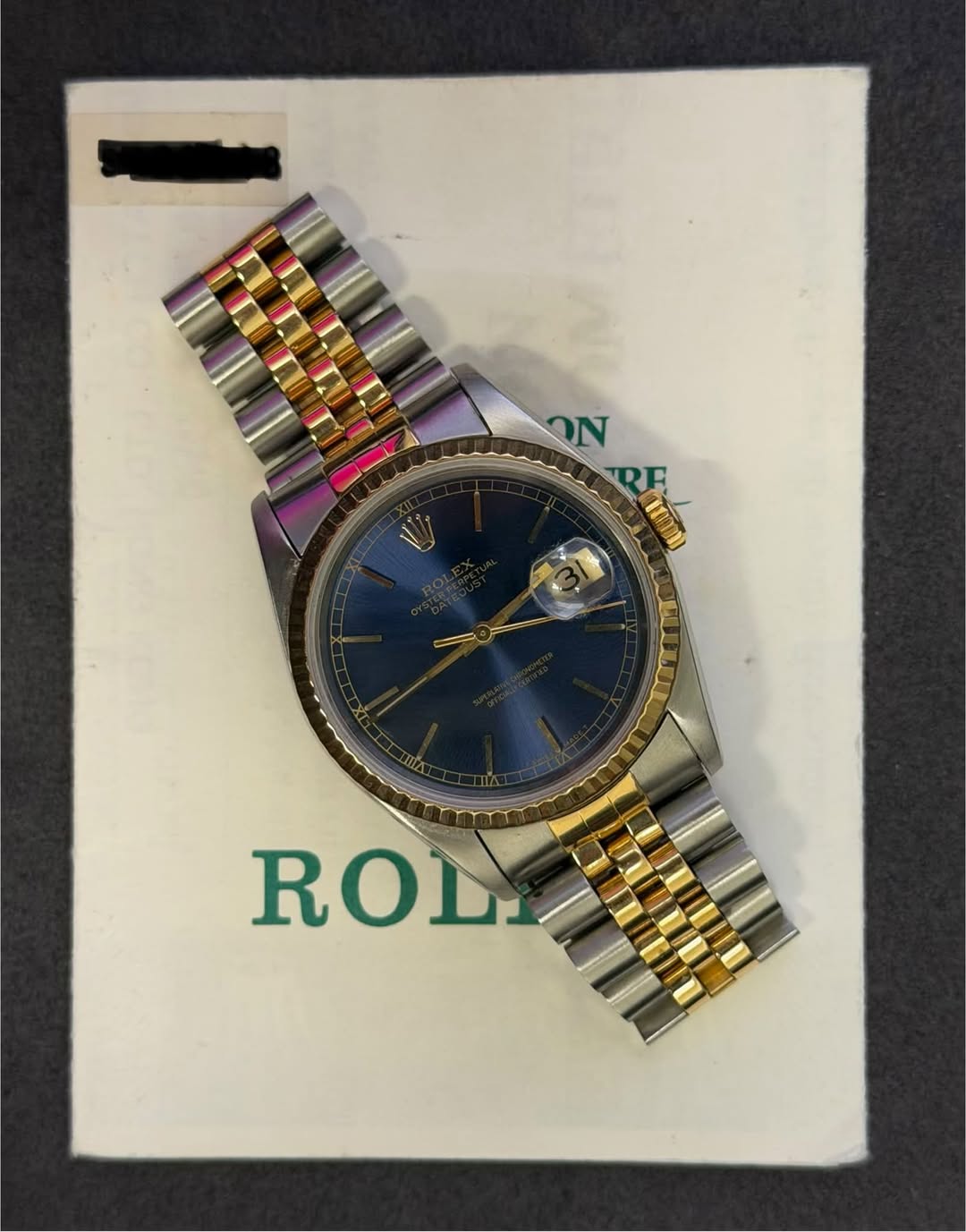 May be an image of wrist watch and text that says 'ON R ROLI'