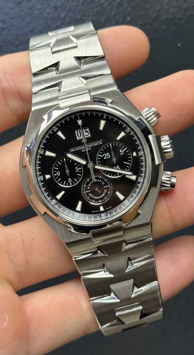 May be an image of wrist watch and text