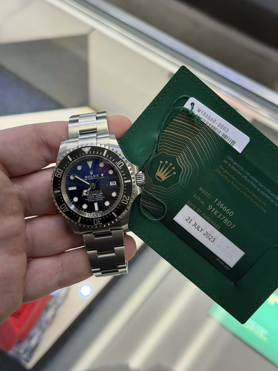 May be an image of wrist watch and text