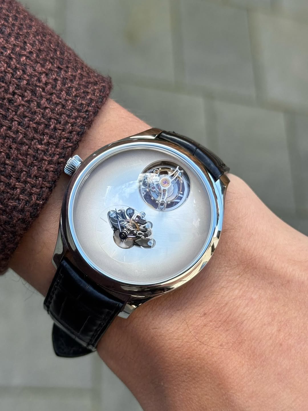 May be an image of wrist watch and text