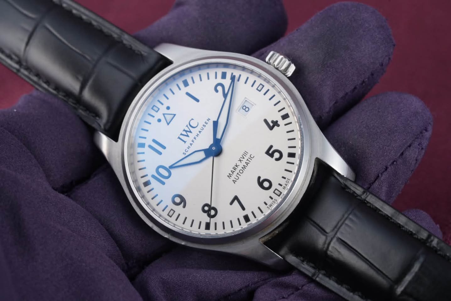 May be an image of wrist watch and text