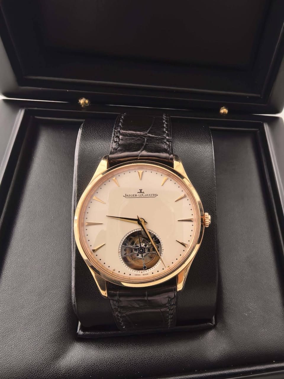 May be an image of wrist watch and text
