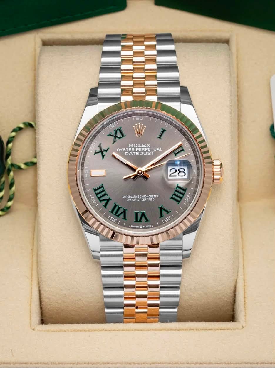 May be an image of wrist watch and text that says ' I 5 50 XI W X ROLEX OYSTER ERPERPETI TUAL I 10 10 DATEJUST OYSTERPERPETUAL EJUST DATE 45 સો I 28 40 VIIII SUPERLATIVE…
